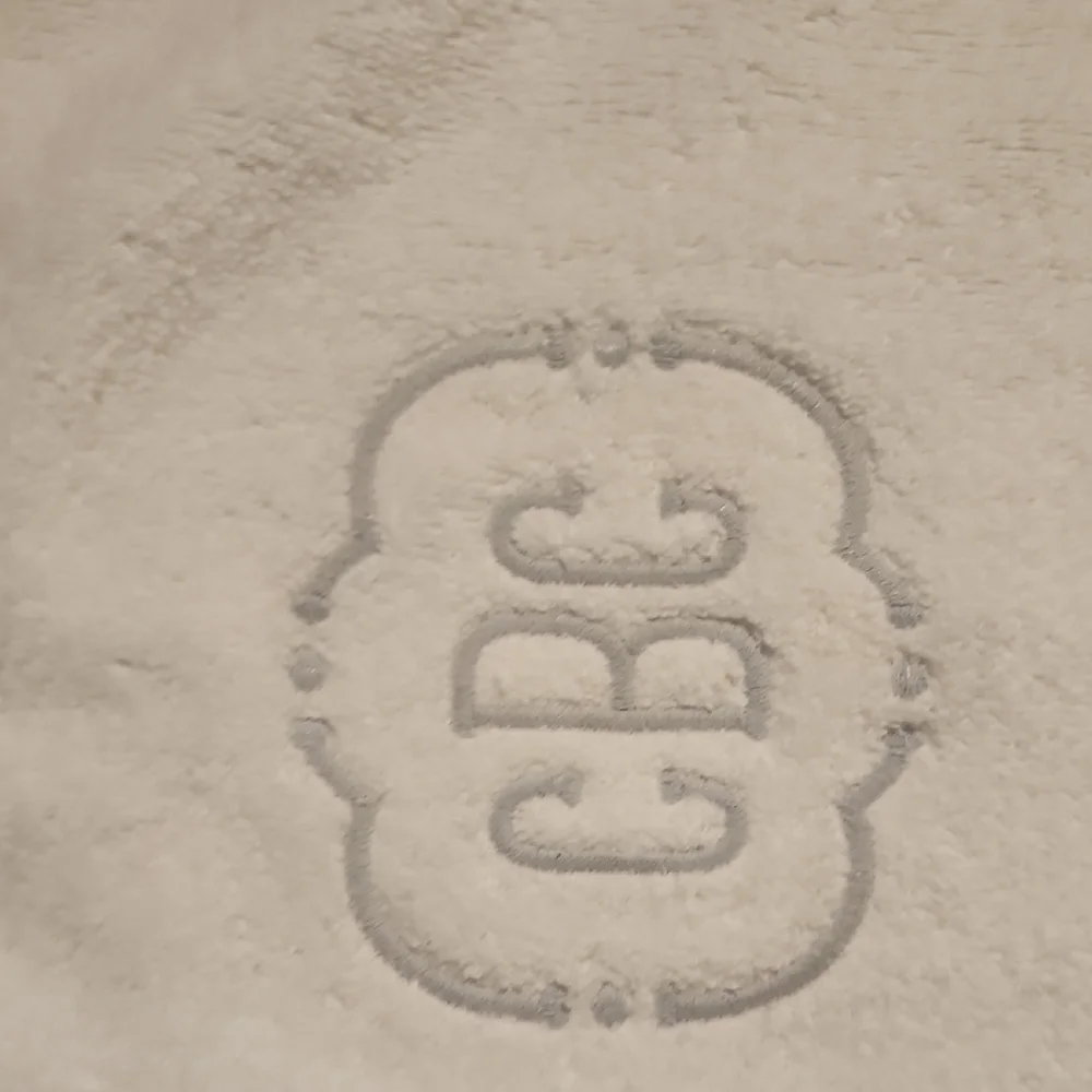 Monogrammed White Bath Towel with Decorative Crest